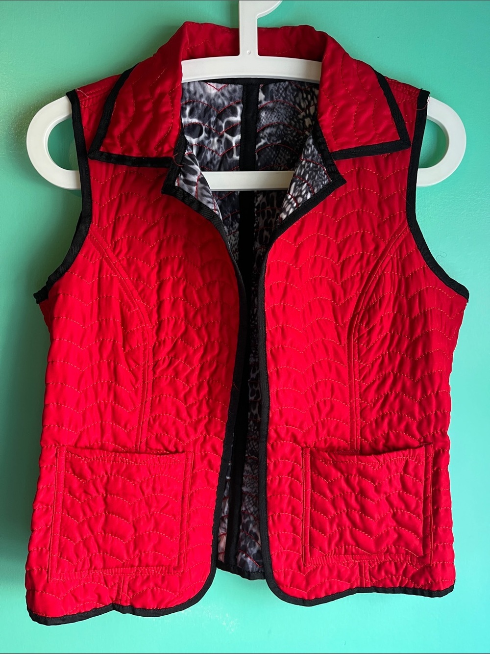 Red Quilted Sleeveless Jacket with Black Trim Reversible To Animal Print